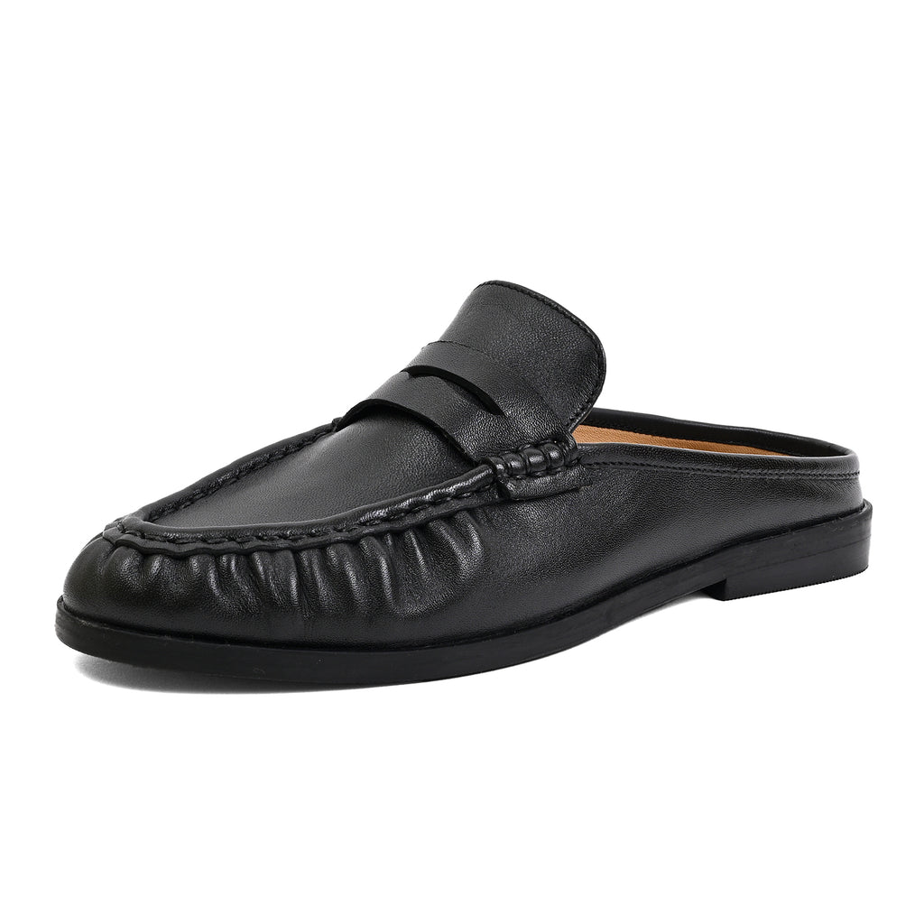 A single black leather slip-on loafer mule with a decorative strap and stitched detailing, shown from a side profile on a white background.