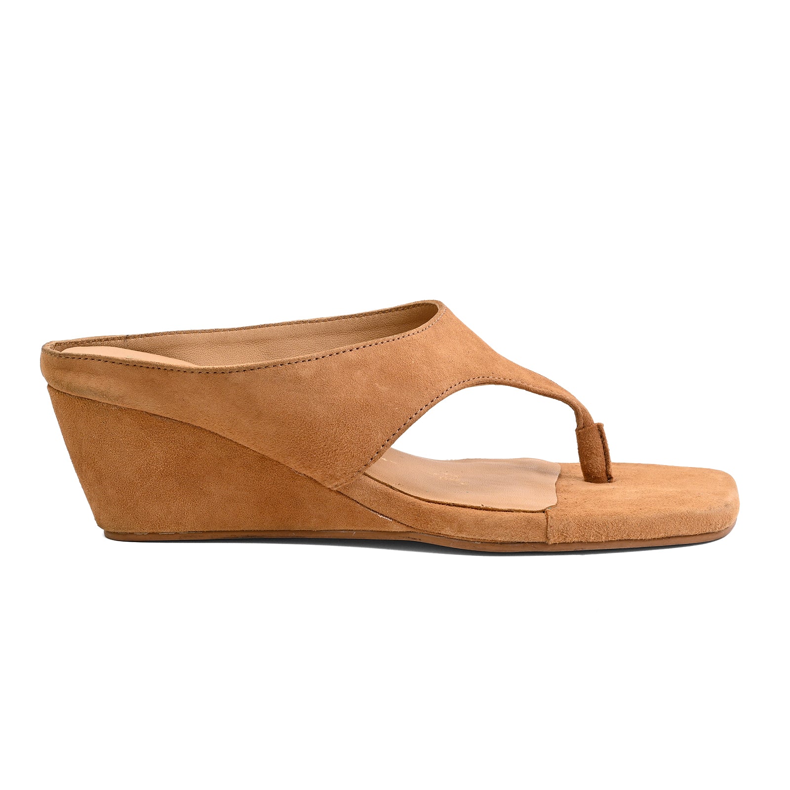 A single tan suede wedge mule sandal with a toe loop, shown in a side profile view against a plain white background.