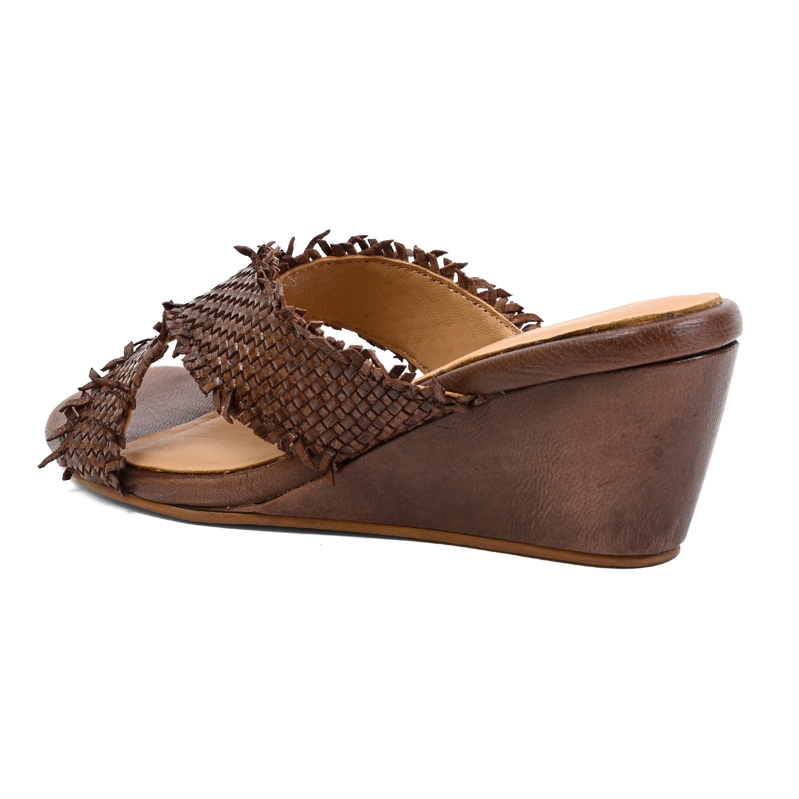 A brown wedge mule sandal with a woven textured strap across the top, photographed from a side angle on a white background.