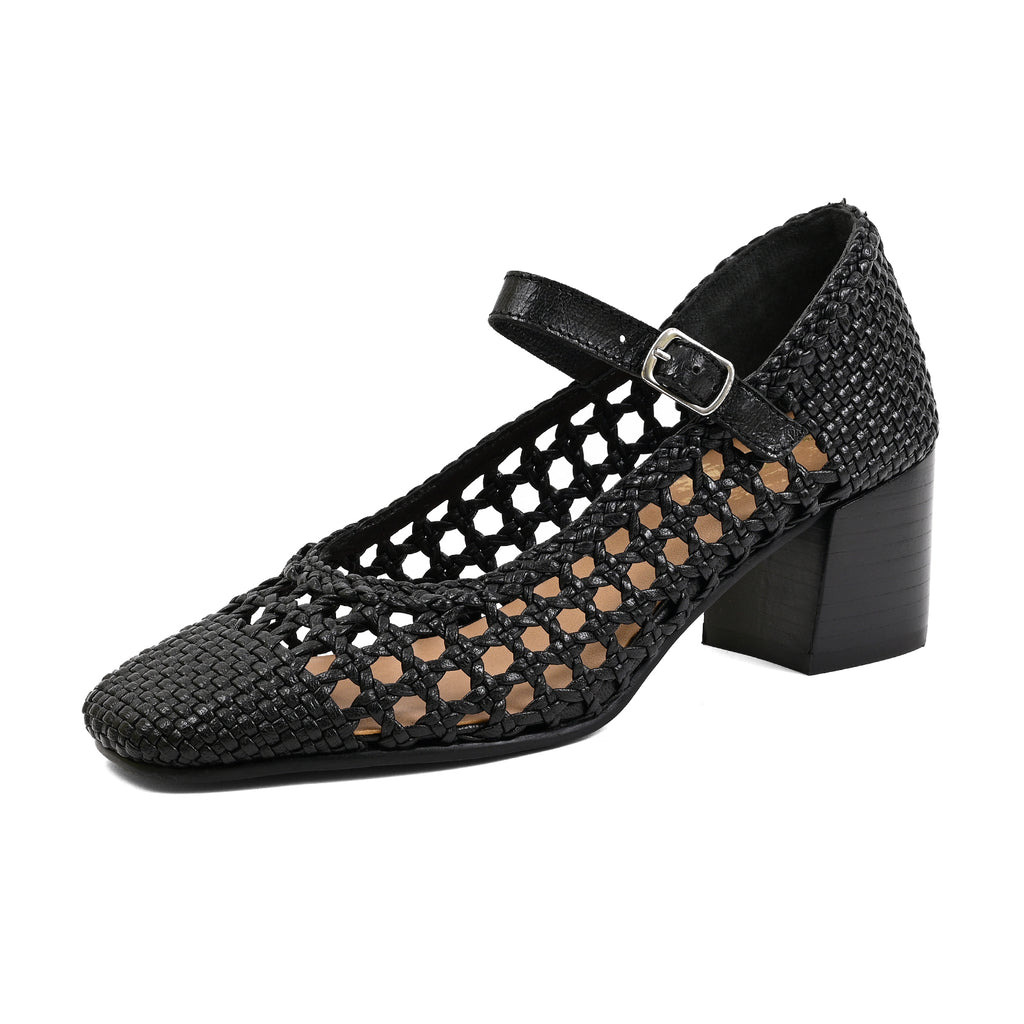A black woven Mary Jane-style pump with a block heel, openwork cutout pattern, and a single ankle strap with a silver buckle, shown on a plain white background.